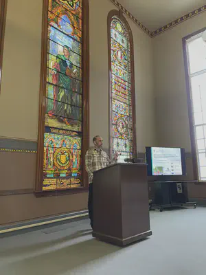 Dr. Sadler in the John Dewey Lounge.